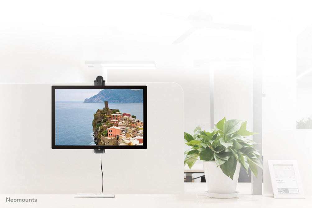 FPMA-CH100BLACK is a desk support that can be hung over a partition wall for flat screens up to 30 inches.