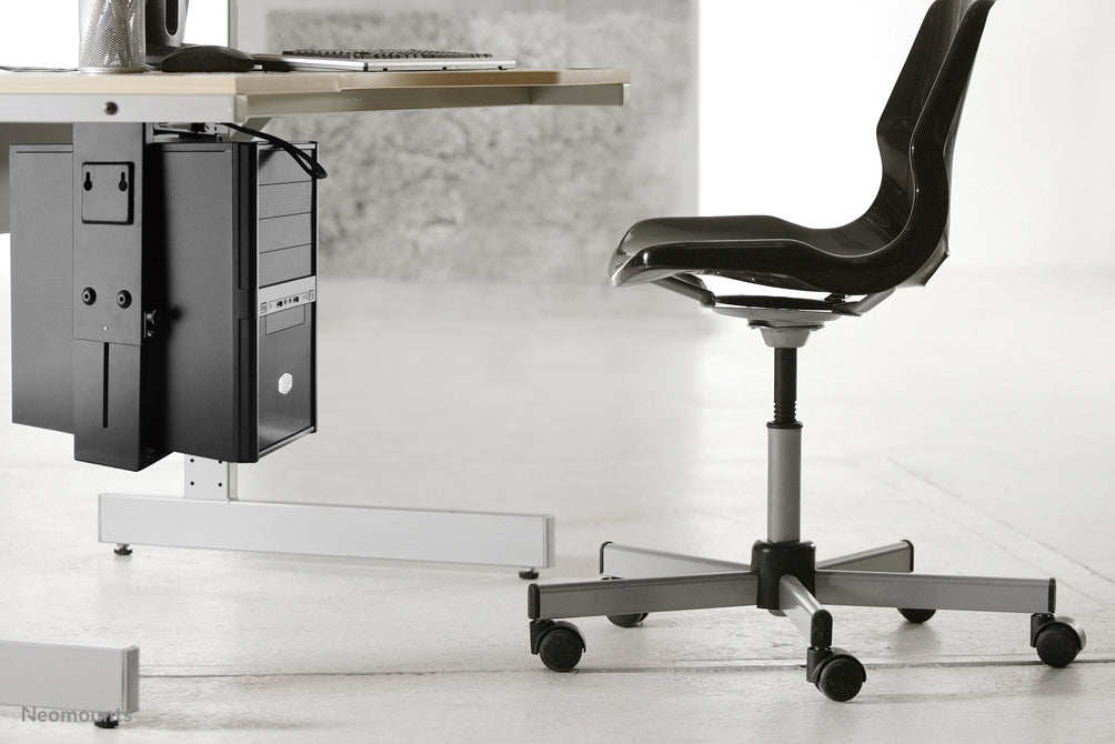 NM-CPU100BLACK is a support that allows you to attach a PC or thin client to the desk.